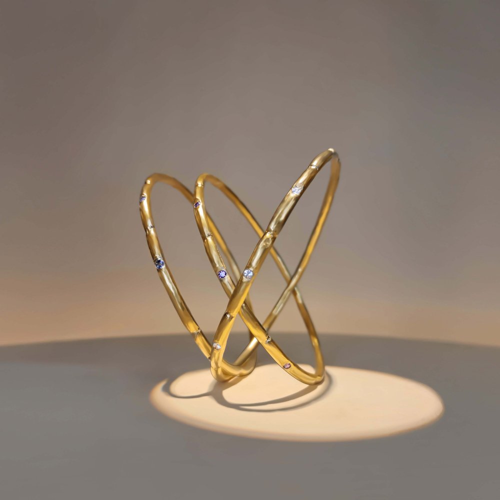 Lab grown diamond baguette half eternity huggie hoop earrings in polished silver finish