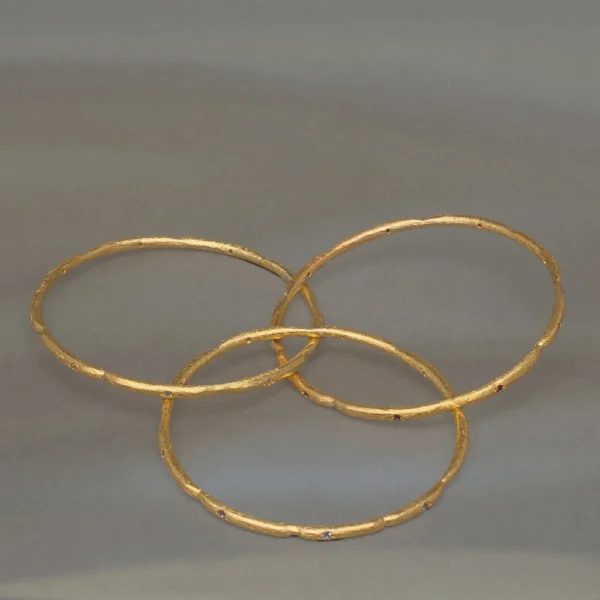 Minimal gold open hoop earrings with bezel-set lab grown diamonds