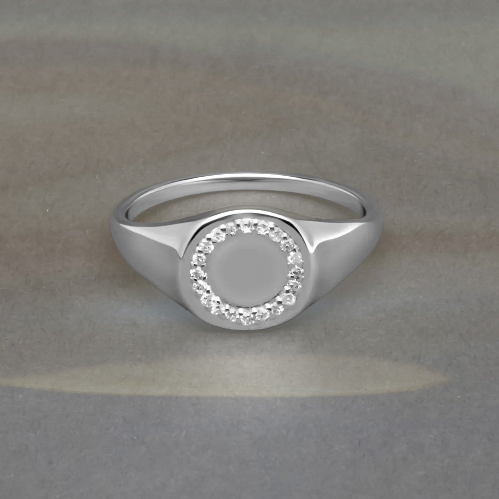 Wholesale 925 silver pavé cubic zirconia signet ring with round CZ-set face—private label ready for B2B jewelry production.