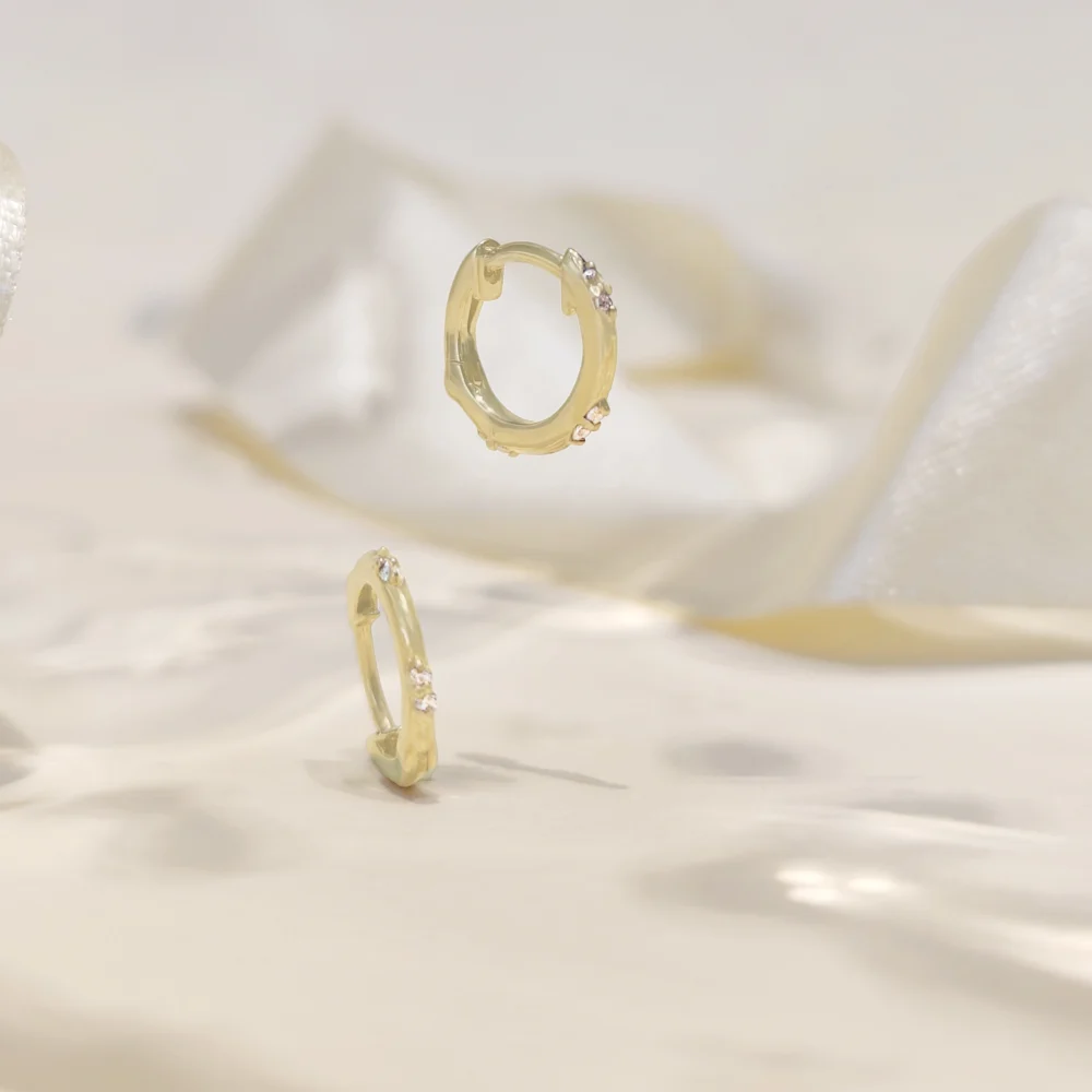 Gold lab grown diamond organic huggie hoop earrings with sculpted minimalist design